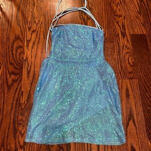 Mini sparkly and backless blue dress with sequins.Lucy in the Sky. Size Medium